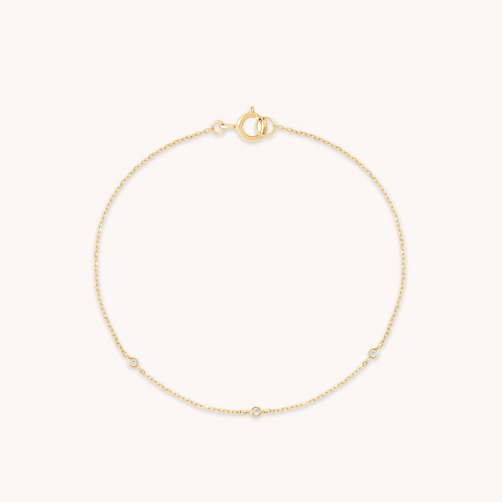 Topaz Charm Bracelet in Solid Gold