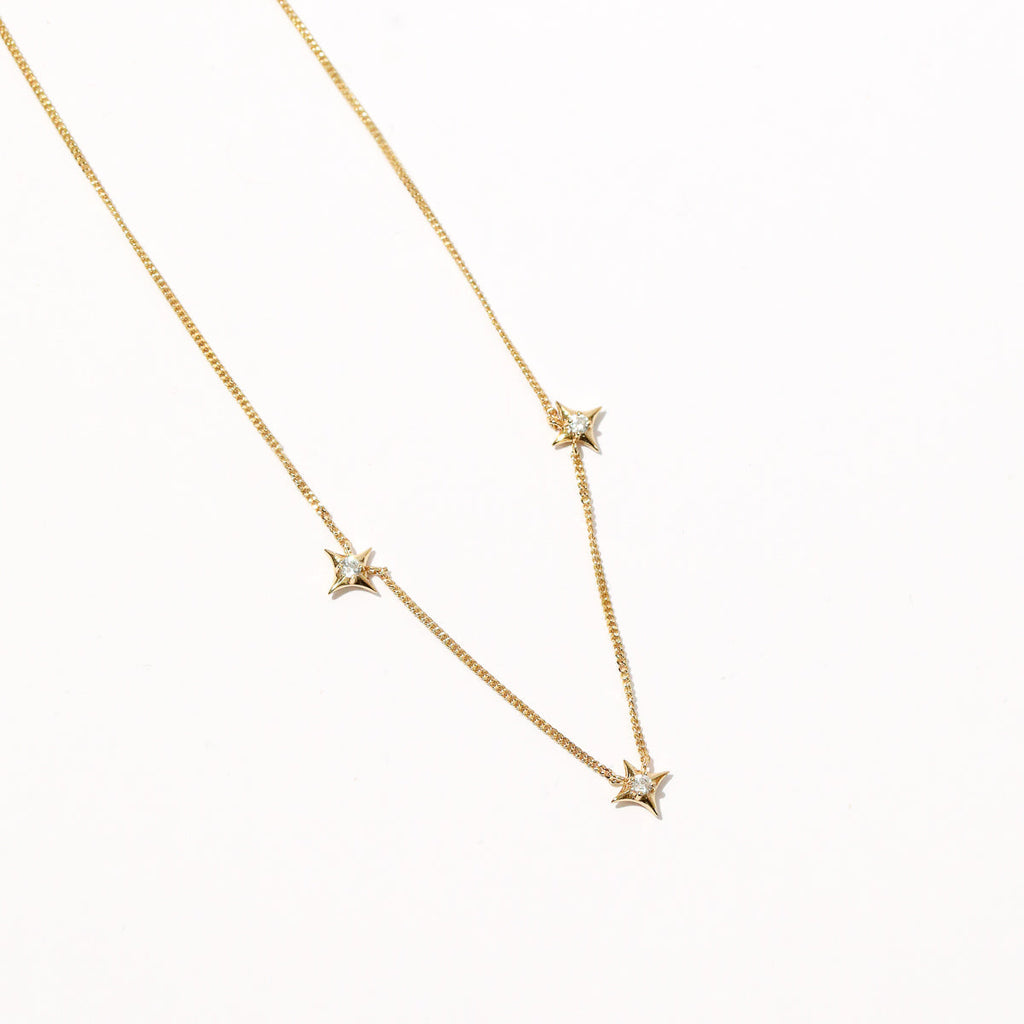 Cosmic Star Charm Necklace in Gold