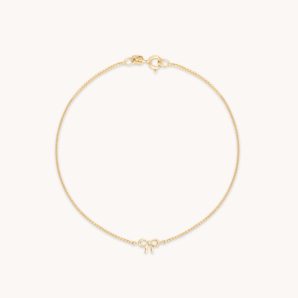 Bow Charm Bracelet in Solid Gold
