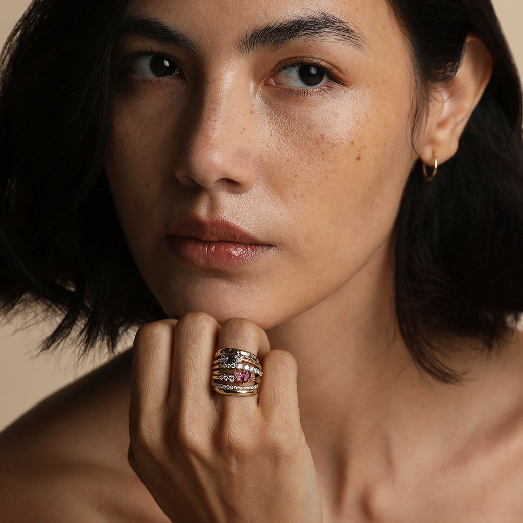 Hidden Diamond Milestone Ring in Solid Gold