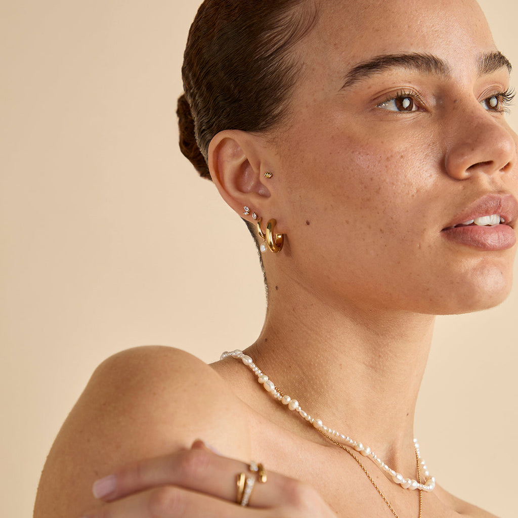 Shell Titanium Piercing Stud in Gold