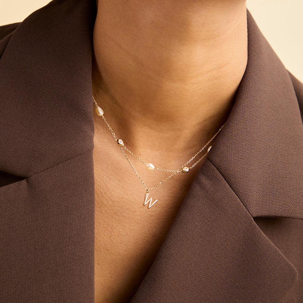 Pearl & Crystal Charm Necklace in Gold