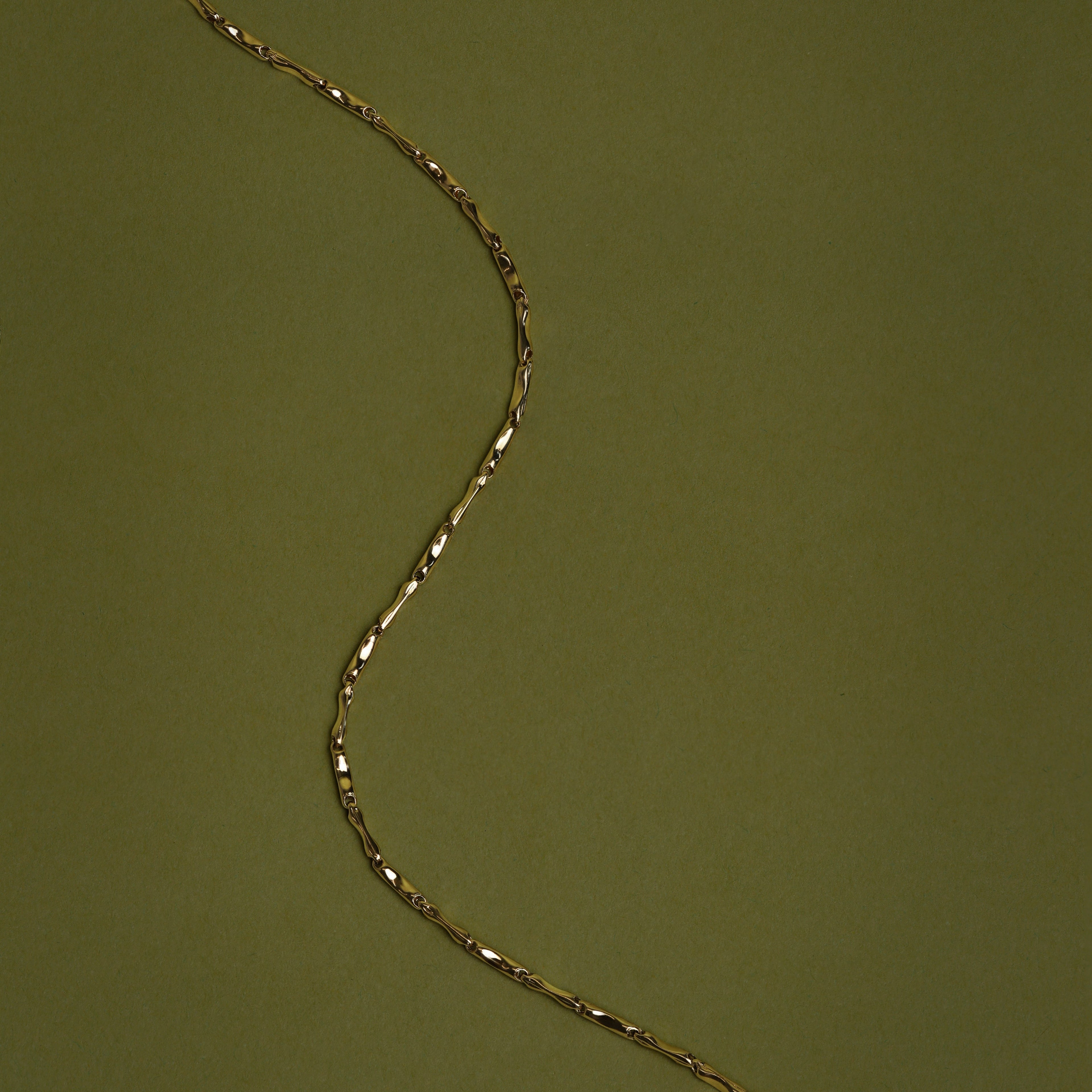 Molten Bar Chain Bracelet in Solid Gold