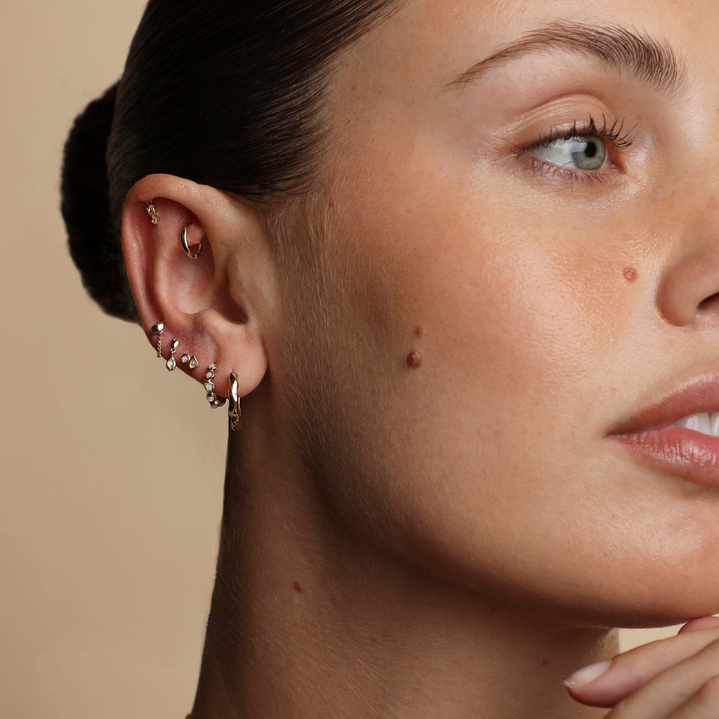 Molten Textured Hoops in Solid Gold