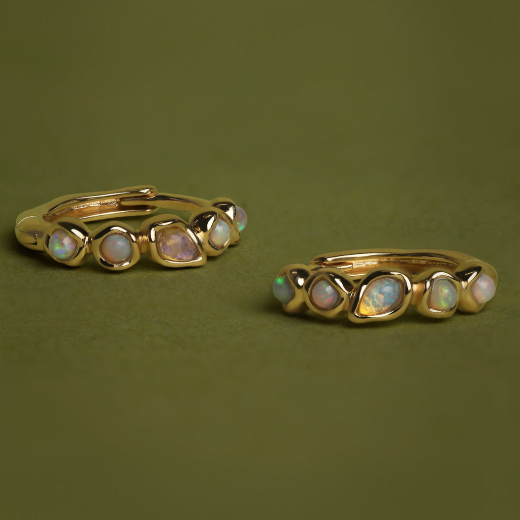Opal Pear Bezel Huggies in Solid Gold