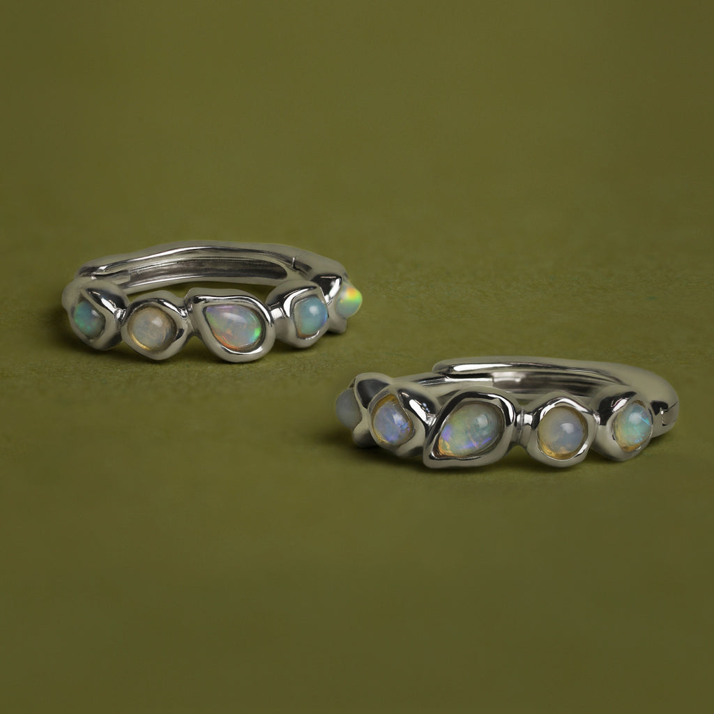 Opal Pear Bezel Huggies in Solid White Gold