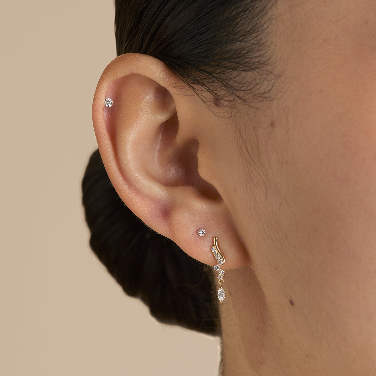 Floating Diamond Small Piercing Stud in Solid Gold