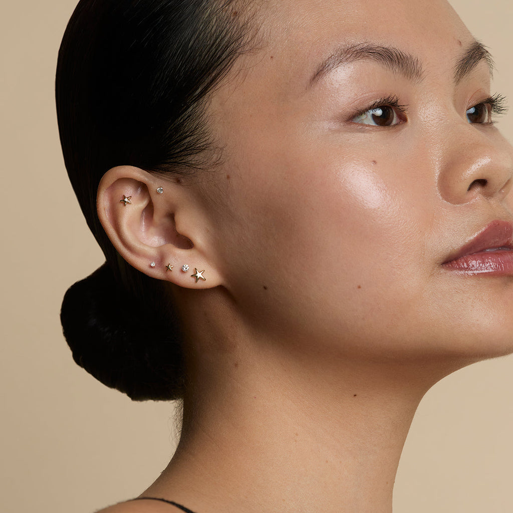 Floating Diamond Small Piercing Stud in Solid Gold