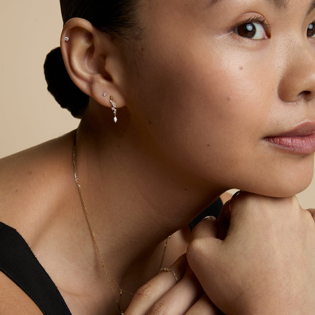 Floating Diamond Small Piercing Stud in Solid Gold