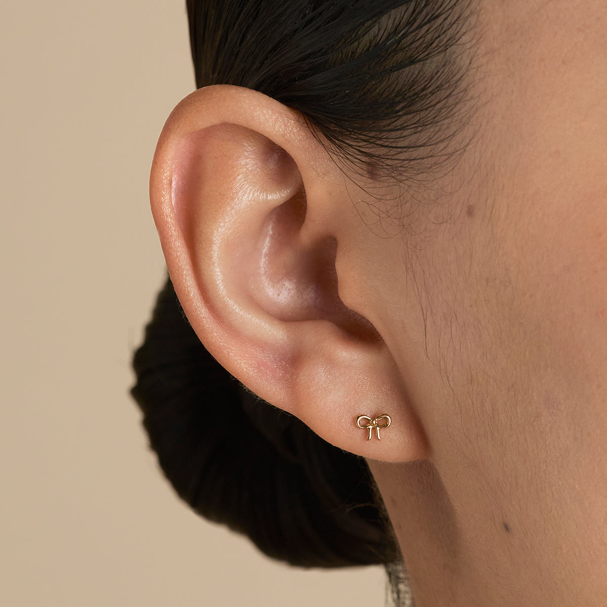 Bow Titanium Piercing Stud in Gold