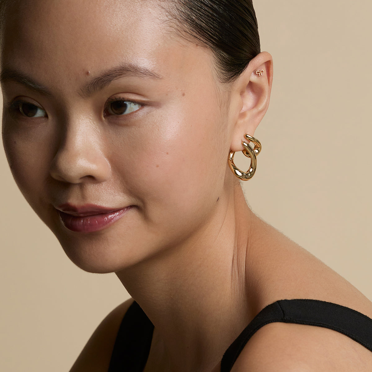 Bow Titanium Piercing Stud in Gold