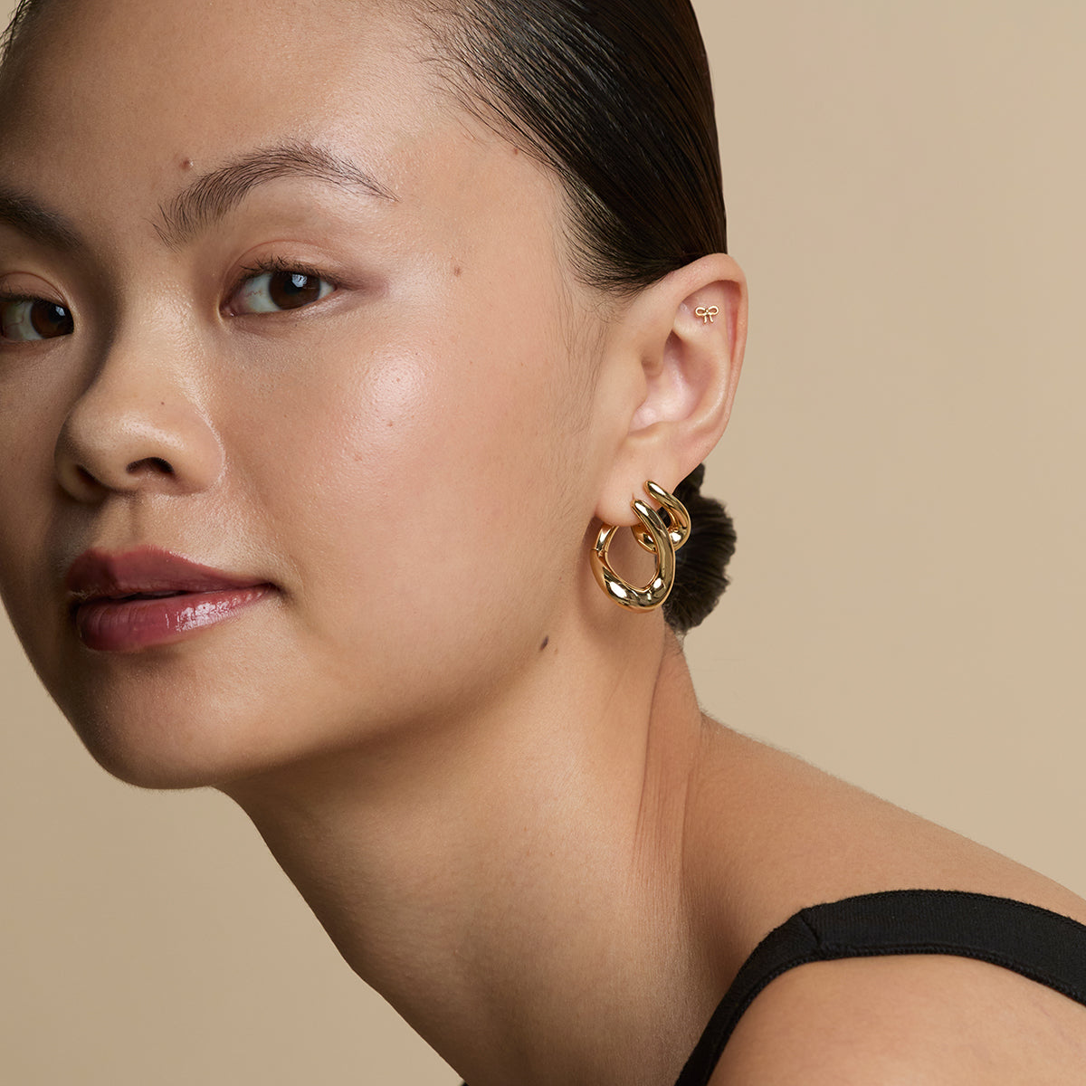 Bow Titanium Piercing Stud in Gold