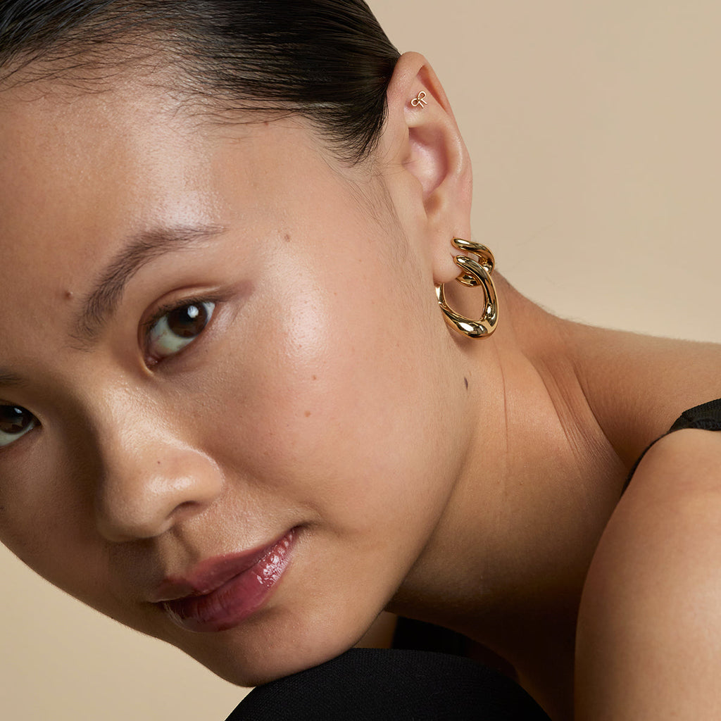 Bow Titanium Piercing Stud in Gold