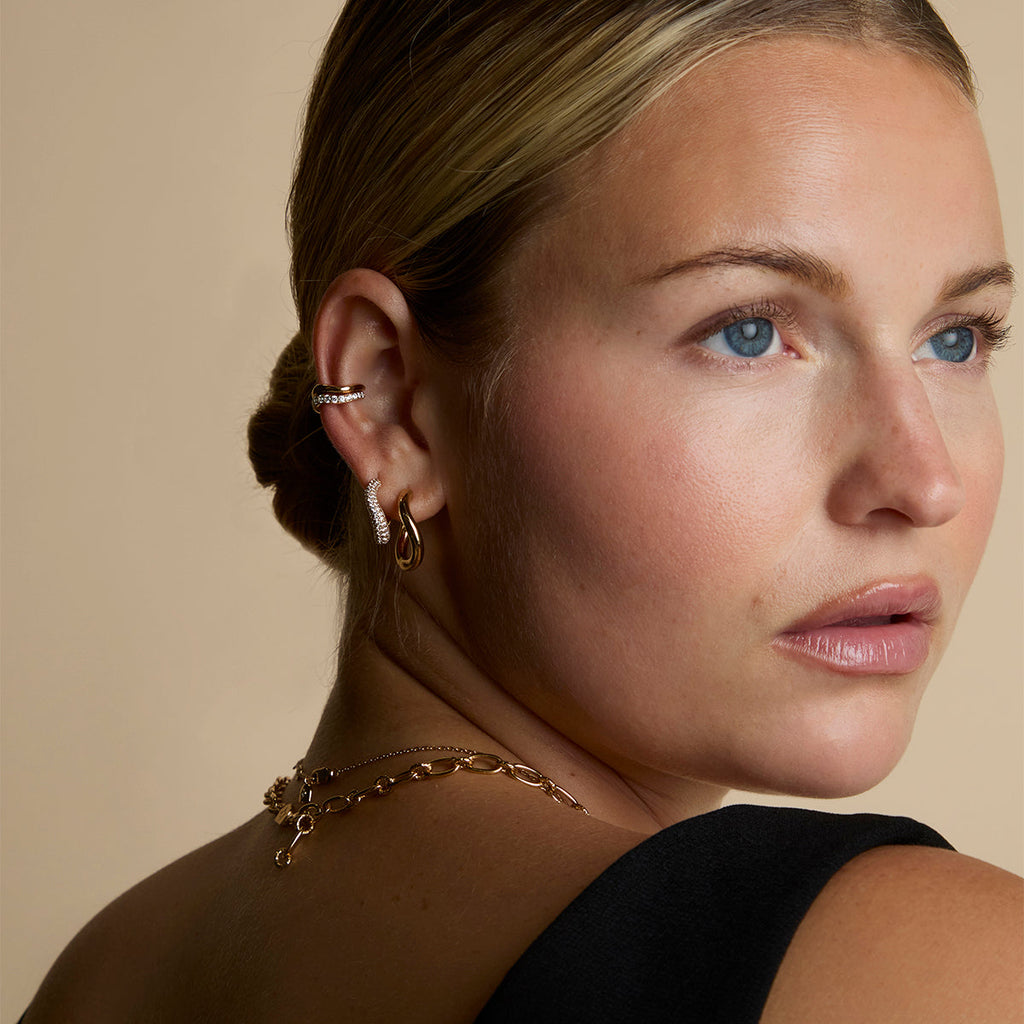 Wave Pavé Crystal Hoops in Gold