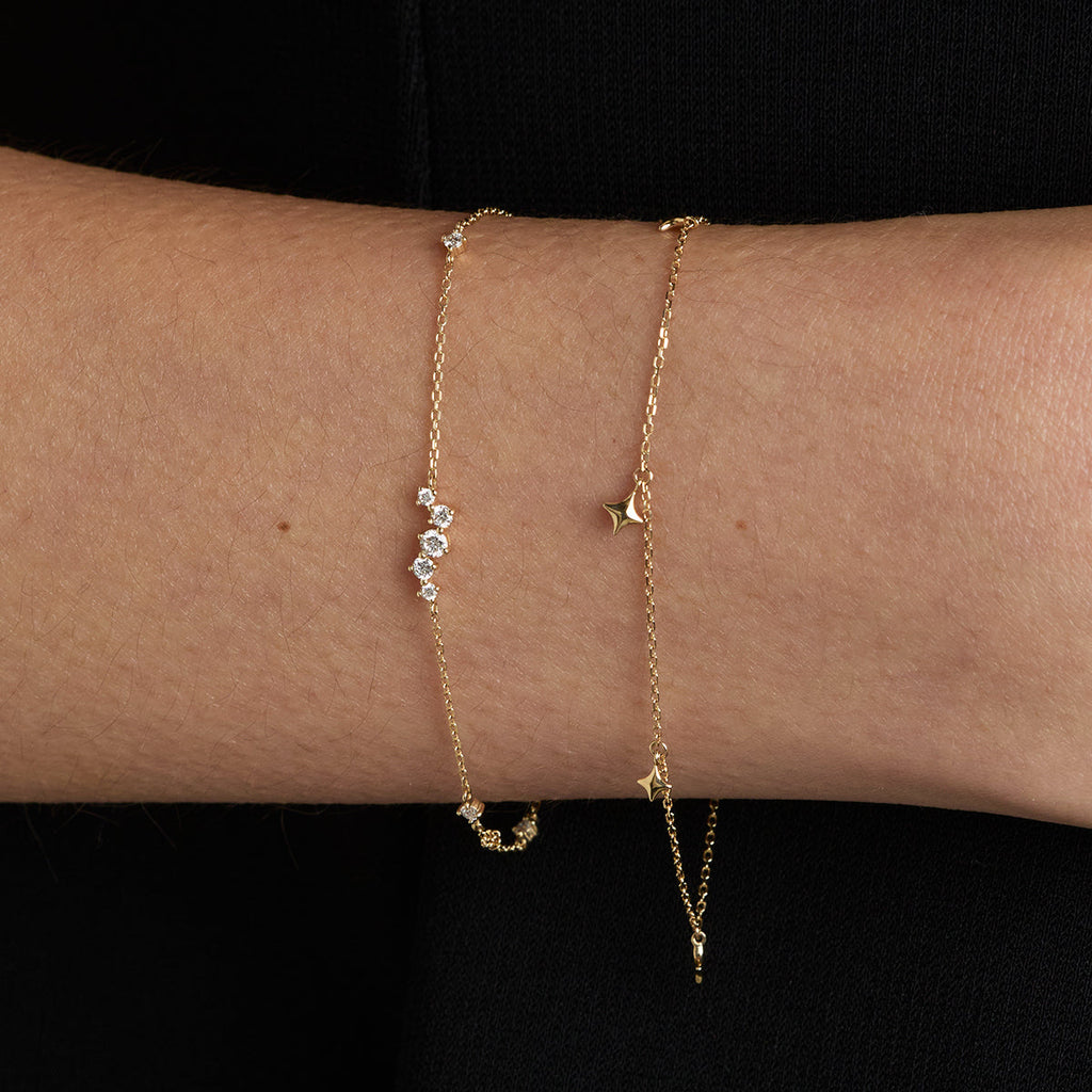 Cosmic Star Charm Bracelet in Solid Gold