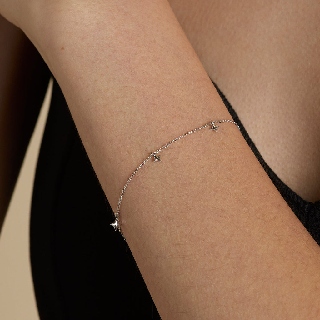Cosmic Star Charm Bracelet in Solid White Gold