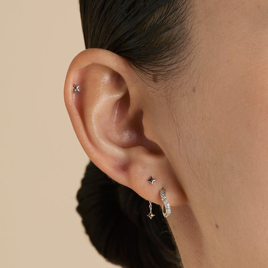 Diamond Wave Huggies in Solid White Gold