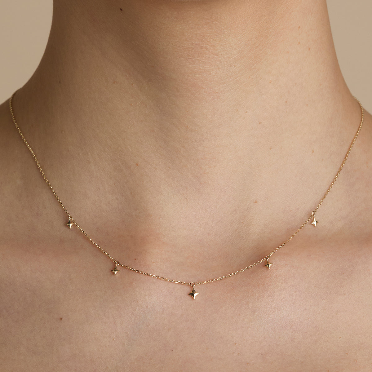 Cosmic Star Charm Necklace in Solid Gold