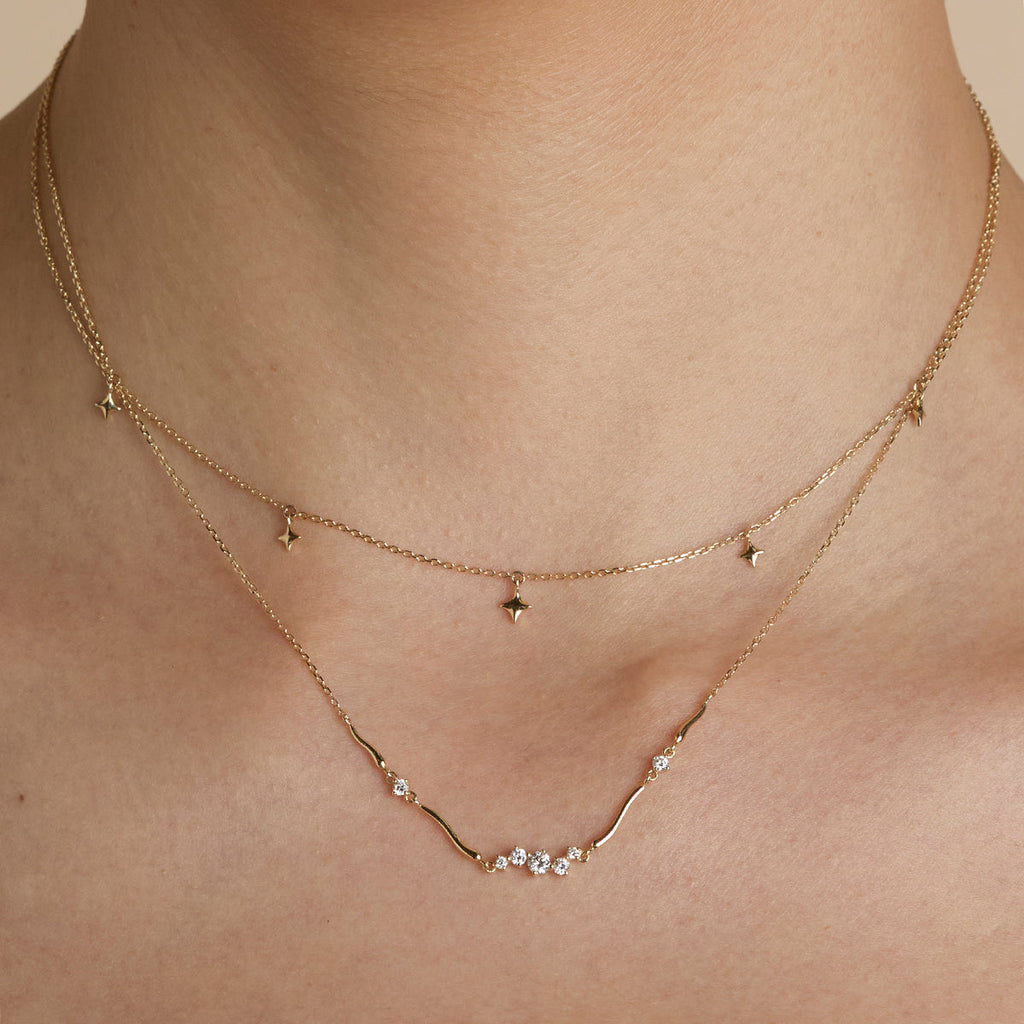 Cosmic Star Charm Necklace in Solid Gold