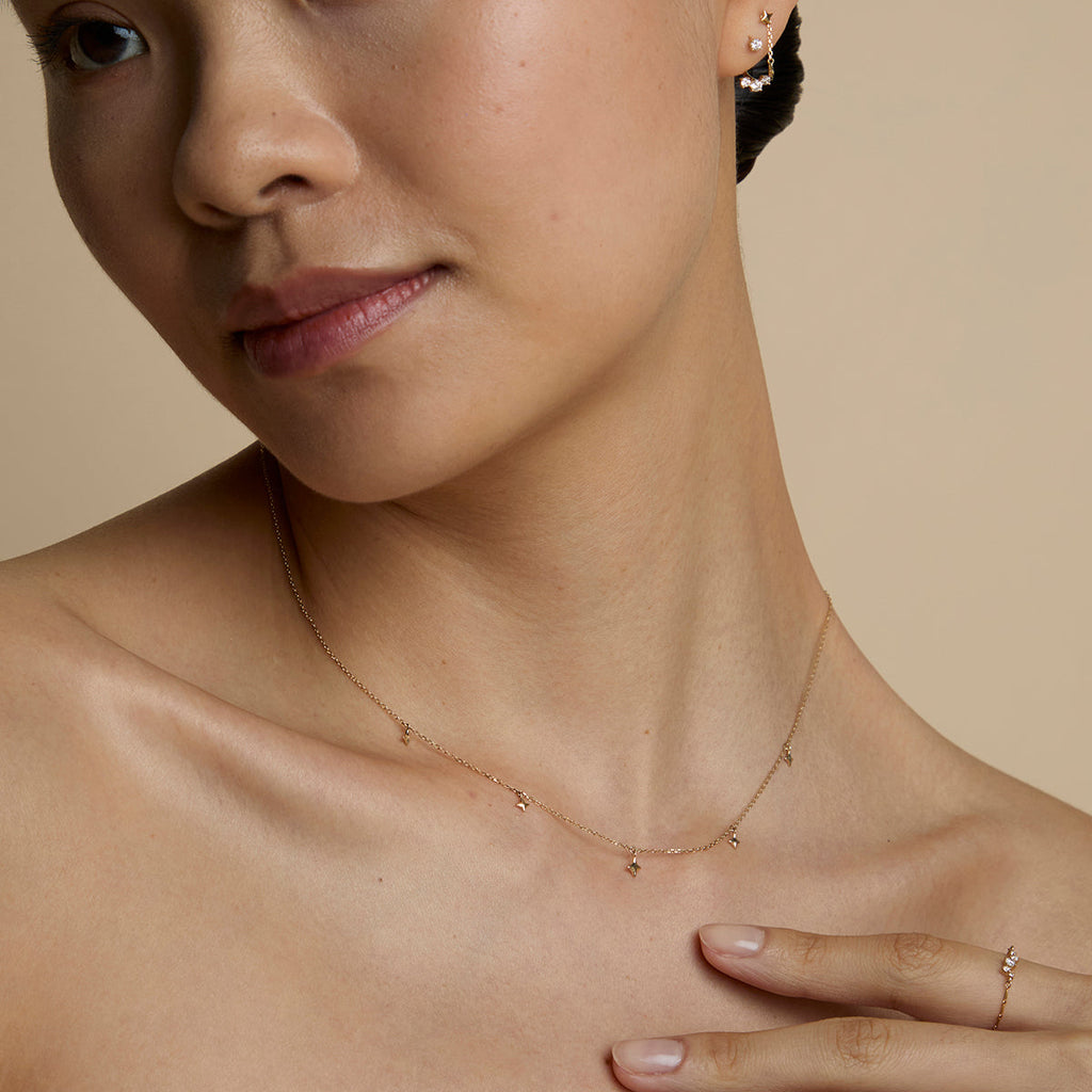 Cosmic Star Charm Necklace in Solid Gold