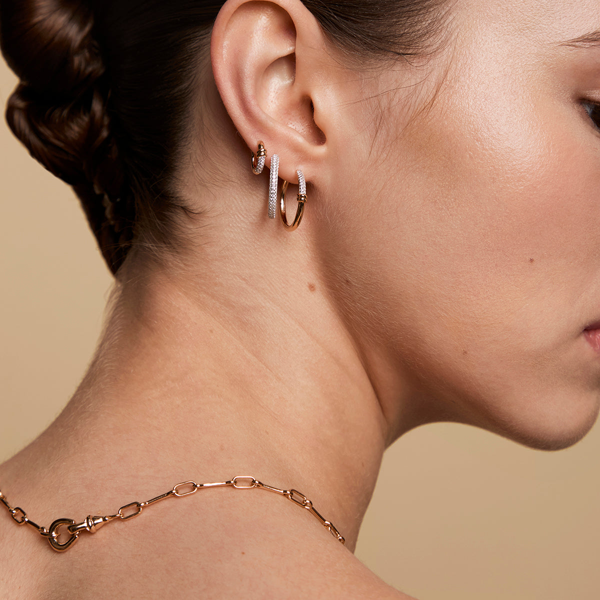 Pavé Knot Huggies in Gold