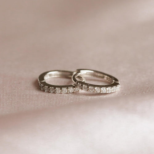 April Birthstone Huggies in Silver with White CZ