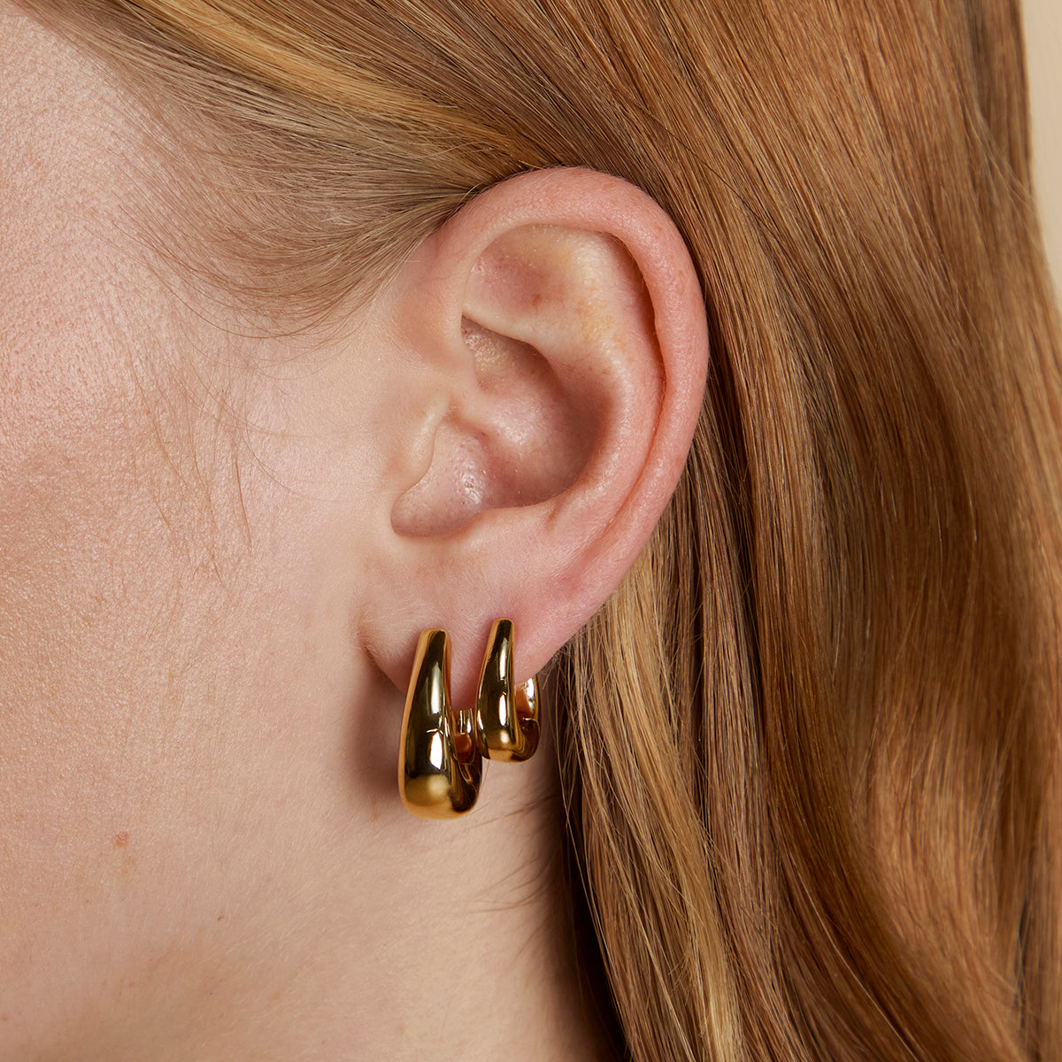 Saddle Medium Hoops in Gold