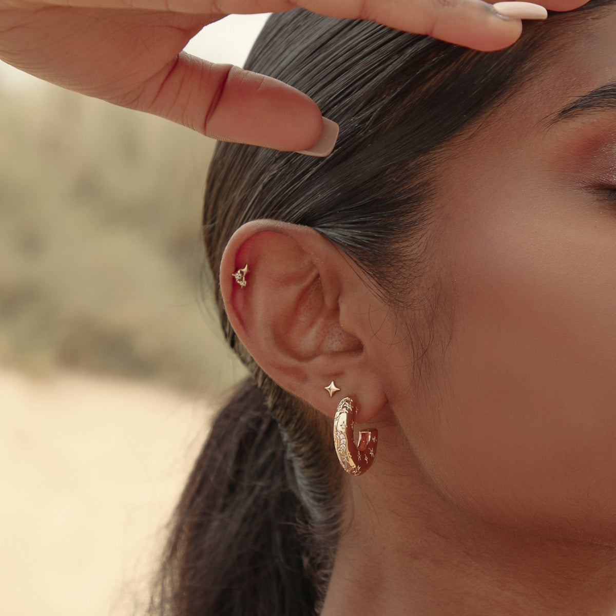 Cosmic Star Piercing Stud in Solid Gold