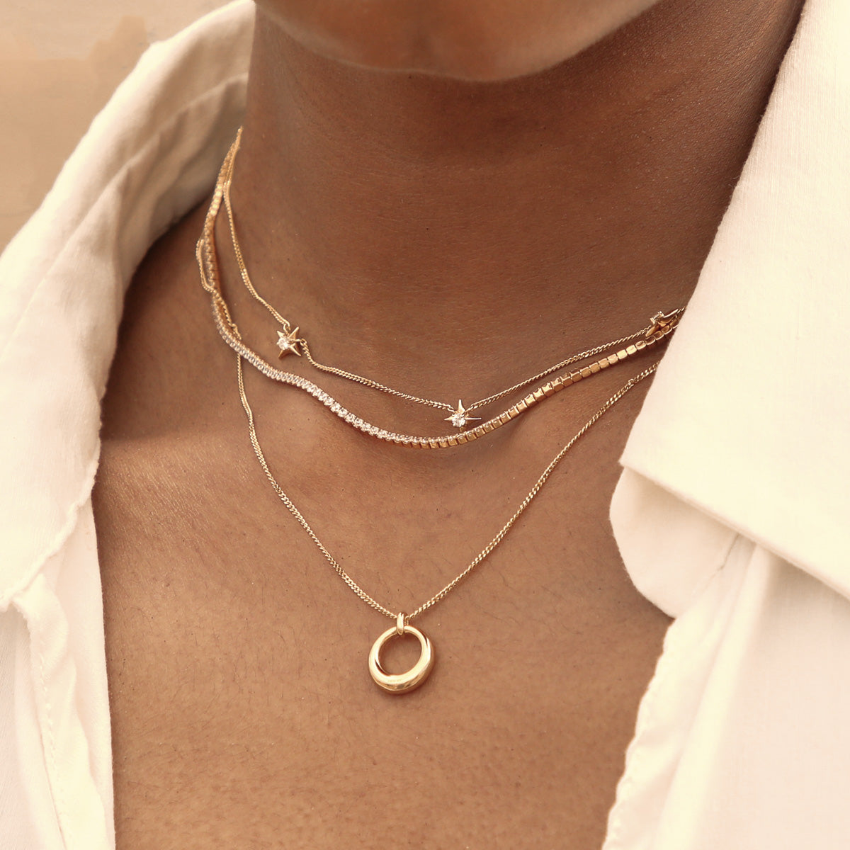 Cosmic Star Charm Necklace in Gold